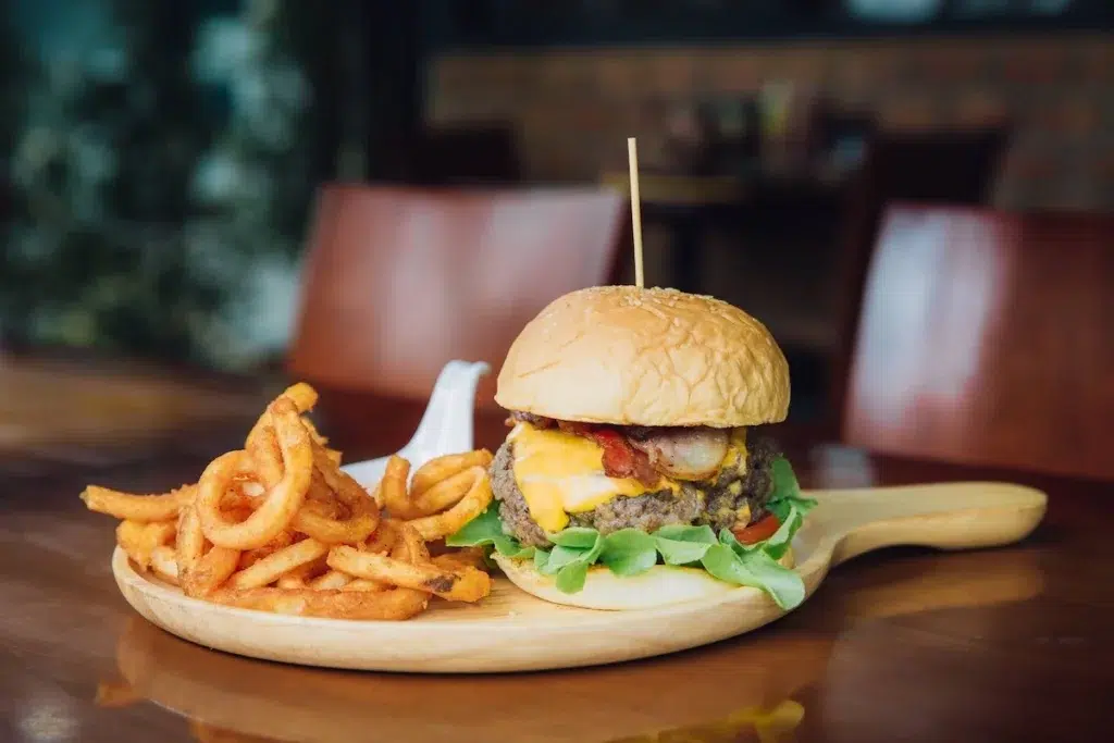 burger with curly french fries at Arno's Thonglor restaurant