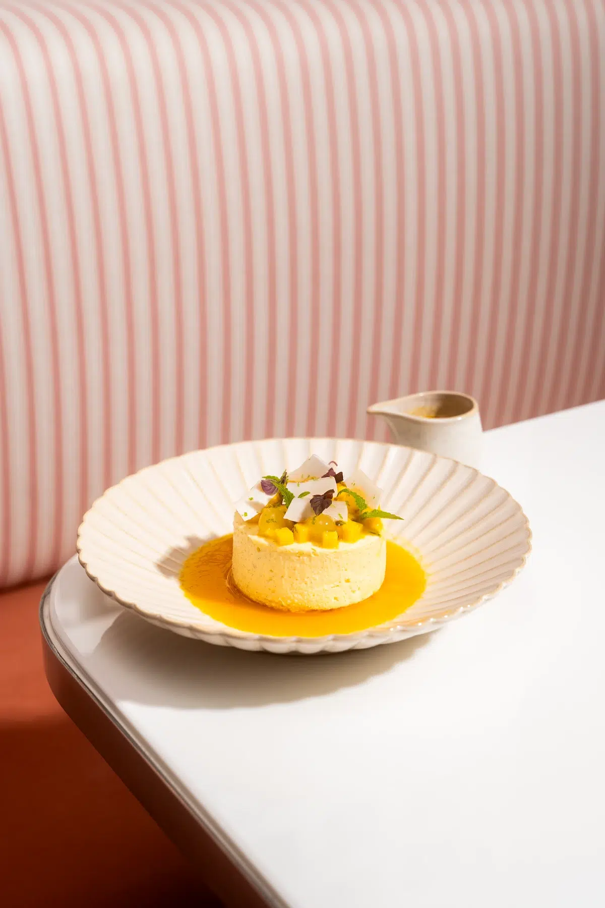 This dessert is the original exotic american cheescake, from Mami Rose Restaurant located in EmSphere mall near UOB Live venue in Bangkok.